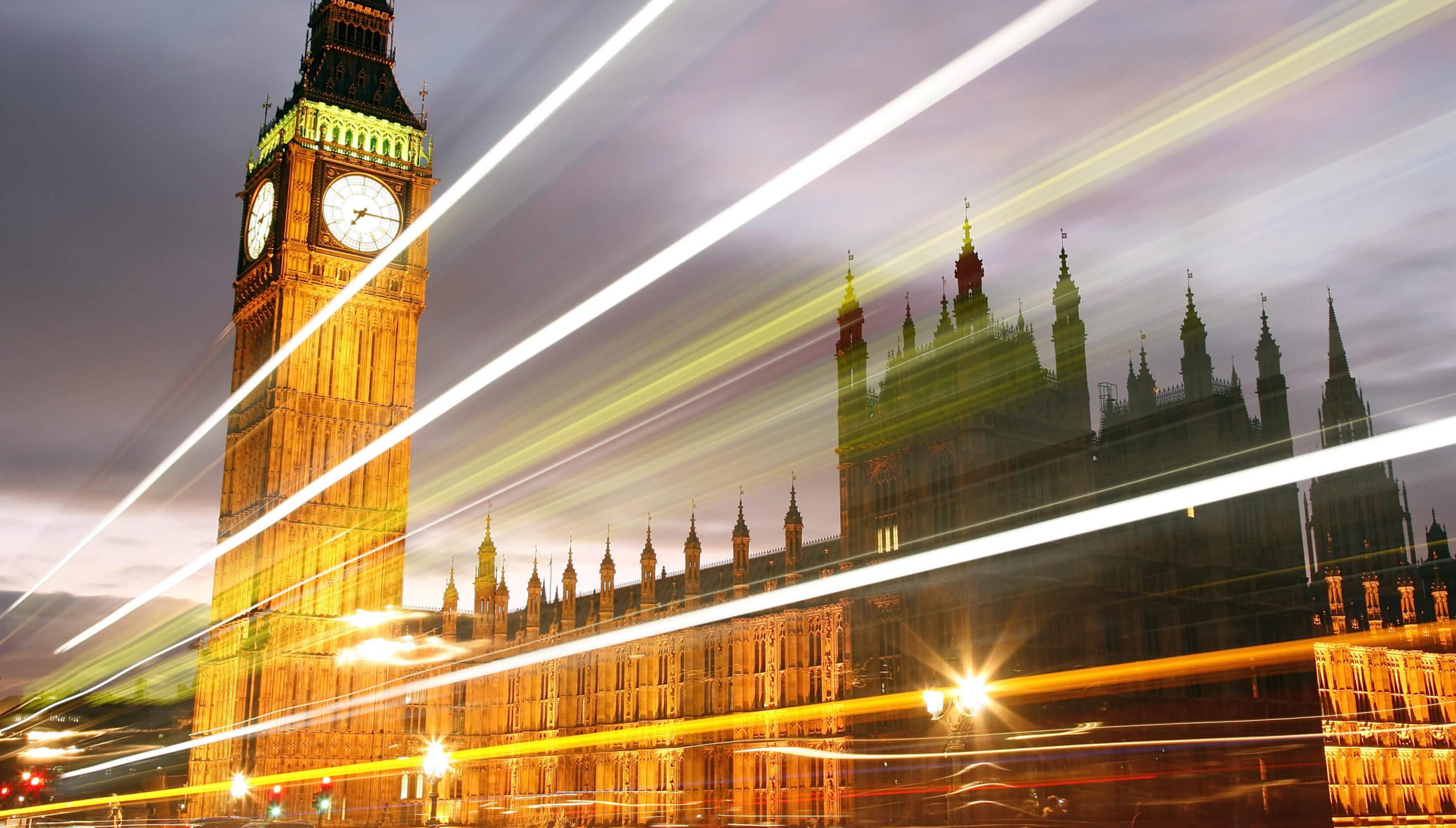 The UK Houses of Parliament and Big Ben, at dusk with lens flare